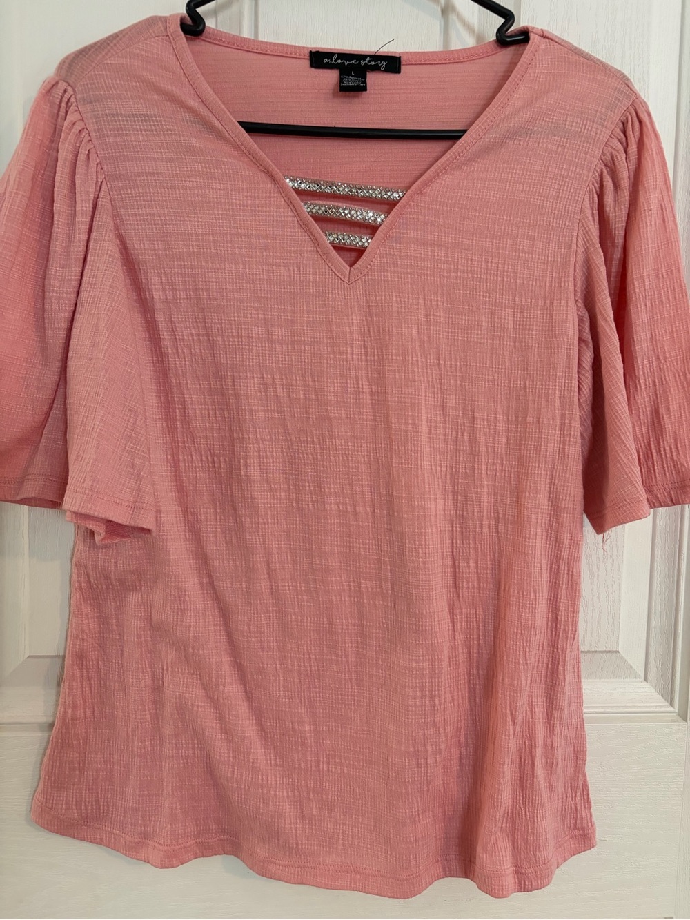 A Love Story Pink V‑Neck Short Sleeve Blouse with Strappy Detail